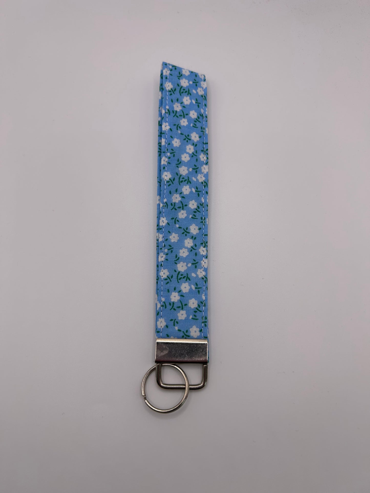 Blue Ditsy White Flowers Wristlet